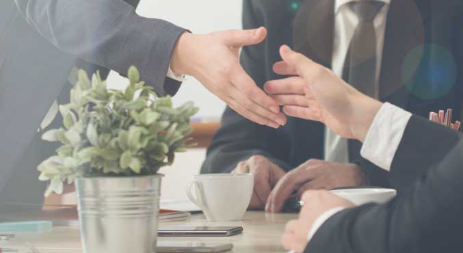 Image of handshake between business people